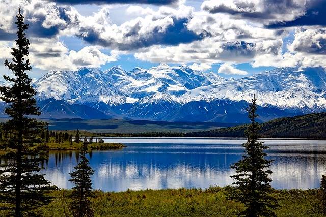 picture of water in Alaska with mountains in the background